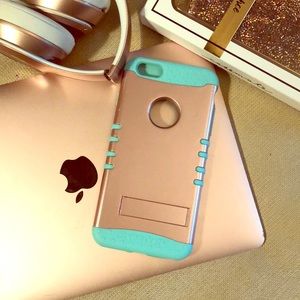 iPhone 6 Plus rose gold case w turquoise silicone.